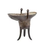 A CHINESE BRONZE ARCHAISTIC RITUAL WINE VESSEL, 'JUE', QIANLONG MARK AND PERIOD, DATED 1738