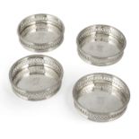 Ⓦ A SET OF FOUR SPANISH SILVER WINE COASTERS, CELESTINO ESPINOSA, MADRID, 1828/29