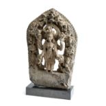 A GREY STONE STELE DEPICTING ARDHANISVARA, NEPAL, 16TH / 17TH CENTURY