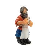 A RUSSIAN STYLE HARDSTONE FIGURE OF A PEASANT, AFTER KARL FABERGE, 20TH CENTURY