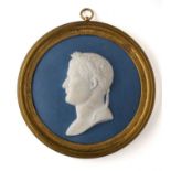 A SEVRES BISCUIT PORTRAIT MEDALLION OF NAPOLEON I, EMPEROR OF THE FRENCH, CIRCA 1809