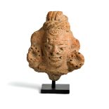 A GUPTA TERRACOTTA HEAD OF A DEITY, CENTRAL INDIA, 4TH / 5TH CENTURY