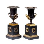 Ⓖ A PAIR OF FRENCH BRONZE PEDESTAL VASES, EMPIRE STYLE