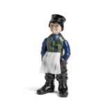 A RUSSIAN STYLE HARDSTONE FIGURE OF A 'DVORNIK' (SHOP BOY), AFTER KARL FABERGE, 20TH CENTURY