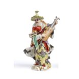 A MEISSEN OUTSIDE DECORATED FIGURE OF A MALE ~MALABAR MUSICIAN~, 20TH CENTURY