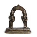 A SMALL BRONZE SHRINE DEPICTING TWO WARRIORS, WESTERN DECCAN, INDIA, CIRCA 18TH CENTURY