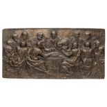 □ A BRONZE PLAQUETTE OF THE LAST SUPPER, PROBABLY GERMAN OR BOHEMIAN, CIRCA 1600-1650