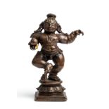 A BRONZE DANCING FIGURE OF KRISHNA, TAMIL NADU, SOUTH INDIA, CIRCA 18TH CENTURY