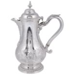 ˜A GEORGE III SILVER HOT WATER JUG, MAKER~S MARK IB (GRIMWADE 3618), LONDON, 1769