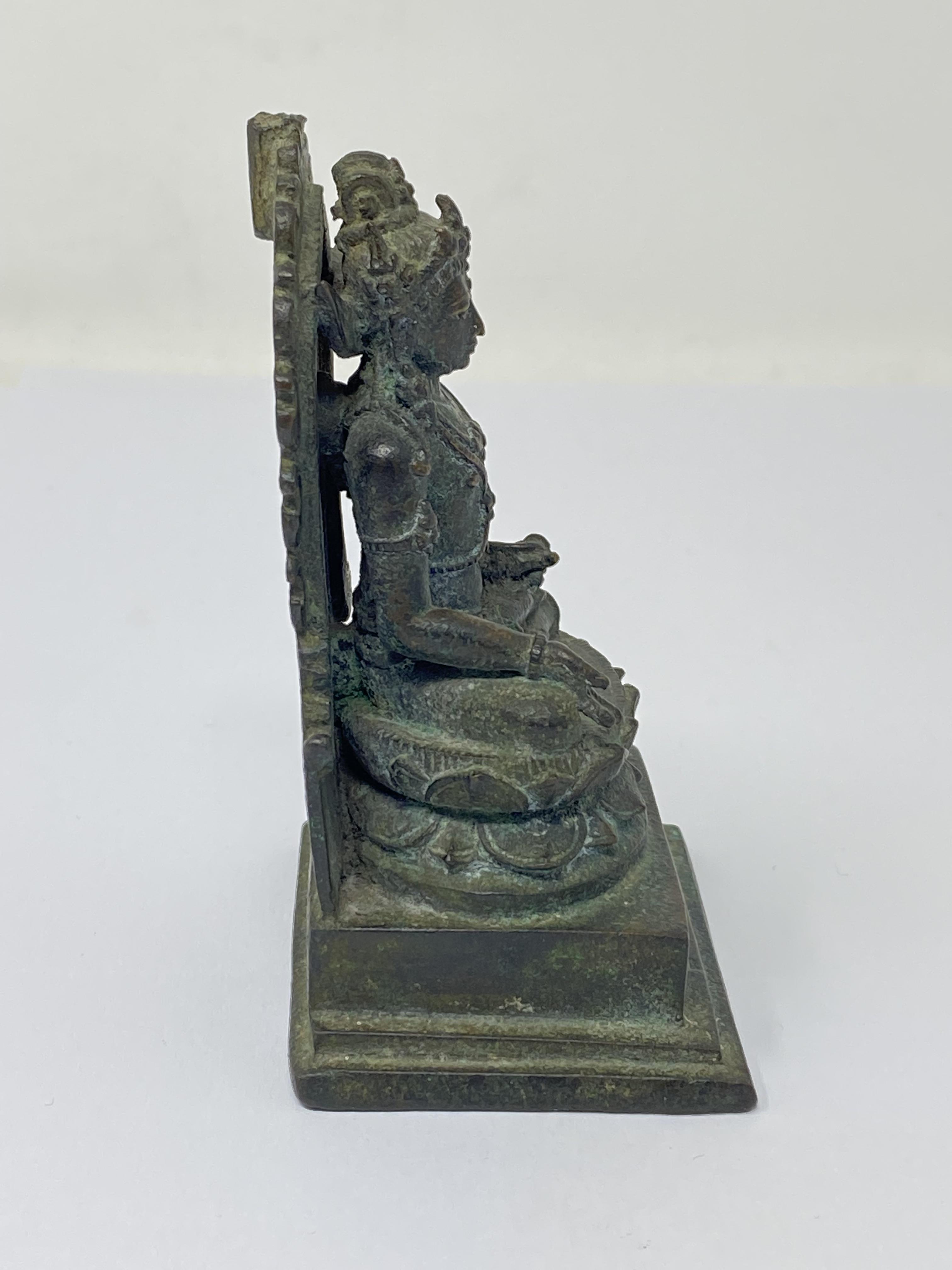 A BRONZE FIGURE OF MANJUSRI, JAVA, INDONESIA, CIRCA 10TH CENTURY - Image 5 of 6