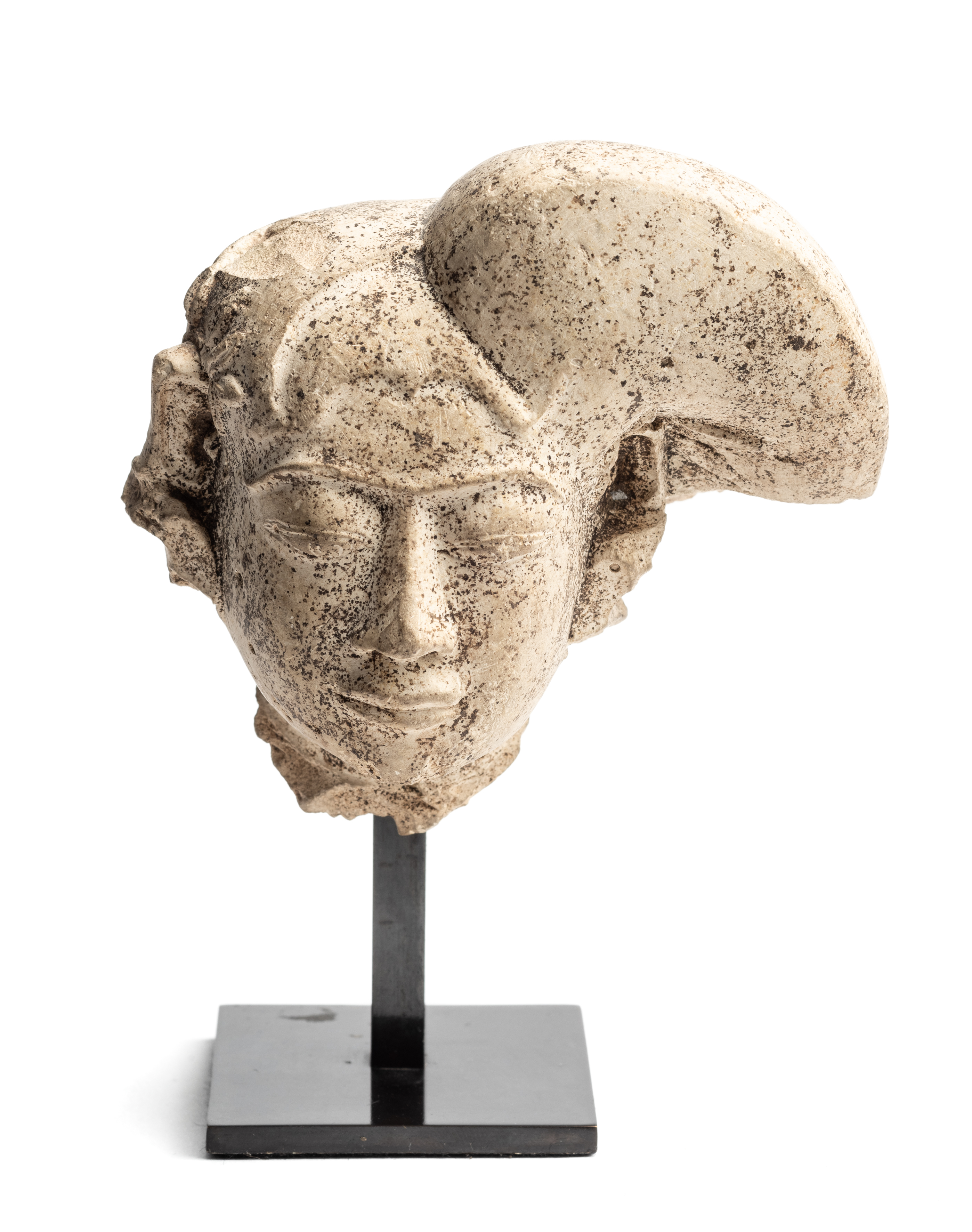 A MAJAPAHIT PUMICE HEAD OF A MAIDEN, JAVA, CIRCA 14TH CENTURY