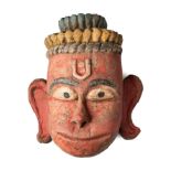 A PAINTED AND CARVED WOOD RITUAL MASK DEPICTING HANUMAN, SOUTH INDIA, 19TH/20TH CENTURY