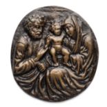□ A BRONZE PLAQUETTE OF THE HOLY FAMILY, PROBABLY 19TH CENTURY