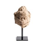 A MAJAPAHIT PUMICE HEAD OF HANUMAN, JAVA, INDONESIA, 14TH CENTURY