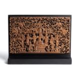 A SMALL CARVED WOOD PANEL, PROBABLY BOMBAY, INDIA, CIRCA 1880