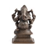 A BRONZE FIGURE OF GANESHA, TAMIL NADU, SOUTH INDIA, 18TH/19TH CENTURY