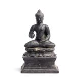 A JAVANESE BRONZE FIGURE OF BUDDHA, INDONESIA, 9TH/10TH CENTURY