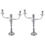A PAIR OF GEORGE III SILVER AND SHEFFIELD PLATE CANDELABRA, S.C. YOUNGE & CO., SHEFFIELD, 1815
