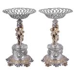 A PAIR OF VICTORIAN PARCEL-GILT SILVER DESSERT STANDS, ALEXANDER MACRAE FOR HARRY EMANUEL, LONDON, 1