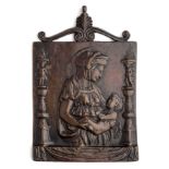 □ AN ITALIAN BRONZE PLAQUETTE OF THE VIRGIN AND CHILD, AFTER DONATELLO (C.1386- 1466), PADUA OR FLOR