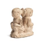 A GROUP OF A PAIR OF INFANTS, MAJAPAHIT, JAVA, CIRCA 14TH CENTURY