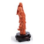 ˜A CHINESE CORAL FIGURE OF SHOU LAO, 20TH CENTURY