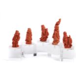 ˜A GROUP OF FIVE CHINESE CORAL FIGURES, 20TH CENTURY