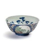 A CHINESE FAMILLE ROSE BLUE-SGRAFFIATO-GROUND ~MEDALLION~ BOWL, DAOGUANG MARK AND PERIOD (1821-1850)