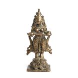 A BRASS FIGURE OF ANNAPURNA, DECCAN, SOUTHERN INDIA, 18TH/19TH CENTURY