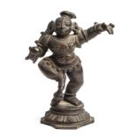 A BRONZE FIGURE OF DANCING KRISHNA, TAMIL NADU, SOUTH INDIA, 18TH/19TH CENTURY