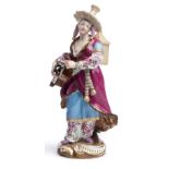 A MEISSEN FIGURE OF A FEMALE ~MALABAR MUSICIAN~, LATE 19TH CENTURY