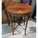 An Edwardian mahogany occasional table with circular top and saltire stretchers, diameter 48 cm