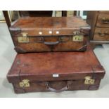 Two vintage leather suitcases