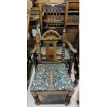 A 19th century elm rocking chair with spindle back and rush seat; an oak gothic style hall chair