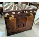 A modern travel trunk in Colonial style, leather and zebra skin finish, 60 cm