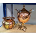A 19th century copper and brass samovar of ovoid form, loop handles with glass inserts, 46 cm; a