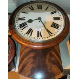 A large drop dial wall clock in figured mahogany circular case with single train fusee movement by