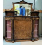 A Victorian figured walnut mirror back credenza with ebonised moulding and ormolu beading and