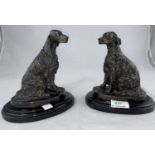 After Barrie: a modern bronze pair of animalier figures, seated setter dogs, height 19