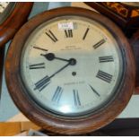A 19th century wall clock in oak circular case, with single train fusee movement, lettered "Dyson