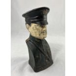 An early 20th century cast iron money box of USA General Pershing