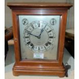 A 20th century mantel clock in mahogany 4 glass case, with key wound balance spring movement and