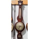 A 19th century large mercury column barometer with thermometer in banjo shaped case with ebony and