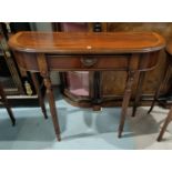 A Georgian style crossbanded mahogany 'D' shaped side table with frieze drawer, on turned reeded