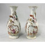 A pair of Chinese vases with relief panel decoration of flowers and vines, height 17cm (damaged