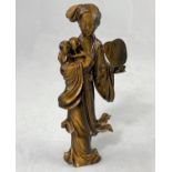 A Chinese figure carved from Tiger's Eye, woman holding fan, height 17cm (head re-attached)