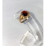 A gent's 9 carat hallmarked gold gypsy style ring, set garnet, 3.2 gm