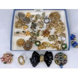 A selection of gilt and other jewellery, brooches; earrings; etc.