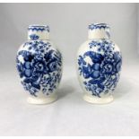 A late 18th century English pair of porcelain covered vases, ovoid shaped decorated with bouquets of