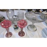 A Victorian cut glass fruit tazza, diameter 27 cm; a similar engraved vase; another; a pair of